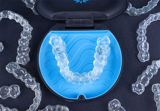 How are the INVISALIGN™ aligners made?